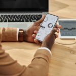 How an LMS Can Transform Your Online Course Business businessman working with financial charts on smart 2023 11 27 05 05 50 utc